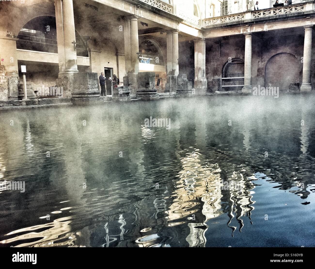 Steam rising from the thermal waters of the Great Bath at the Roman