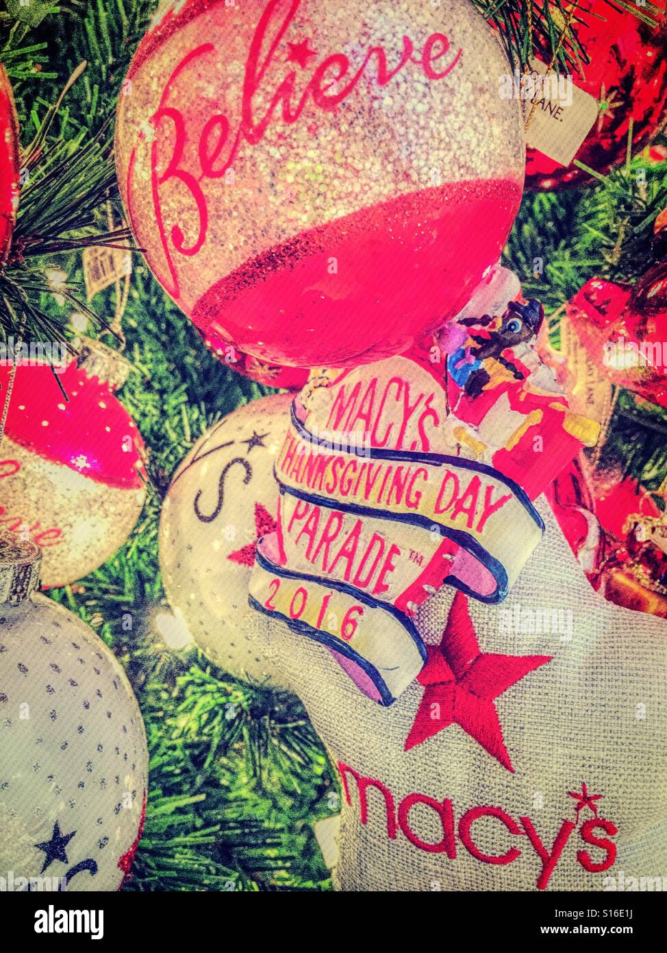 Holiday ornaments in the holiday Lane at Macy's department store, NYC - Smartphone Captured Stock Image