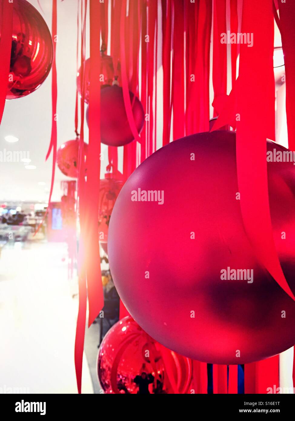 Read Christmas ornaments Hung with red ribbons - Smartphone Captured Stock Image