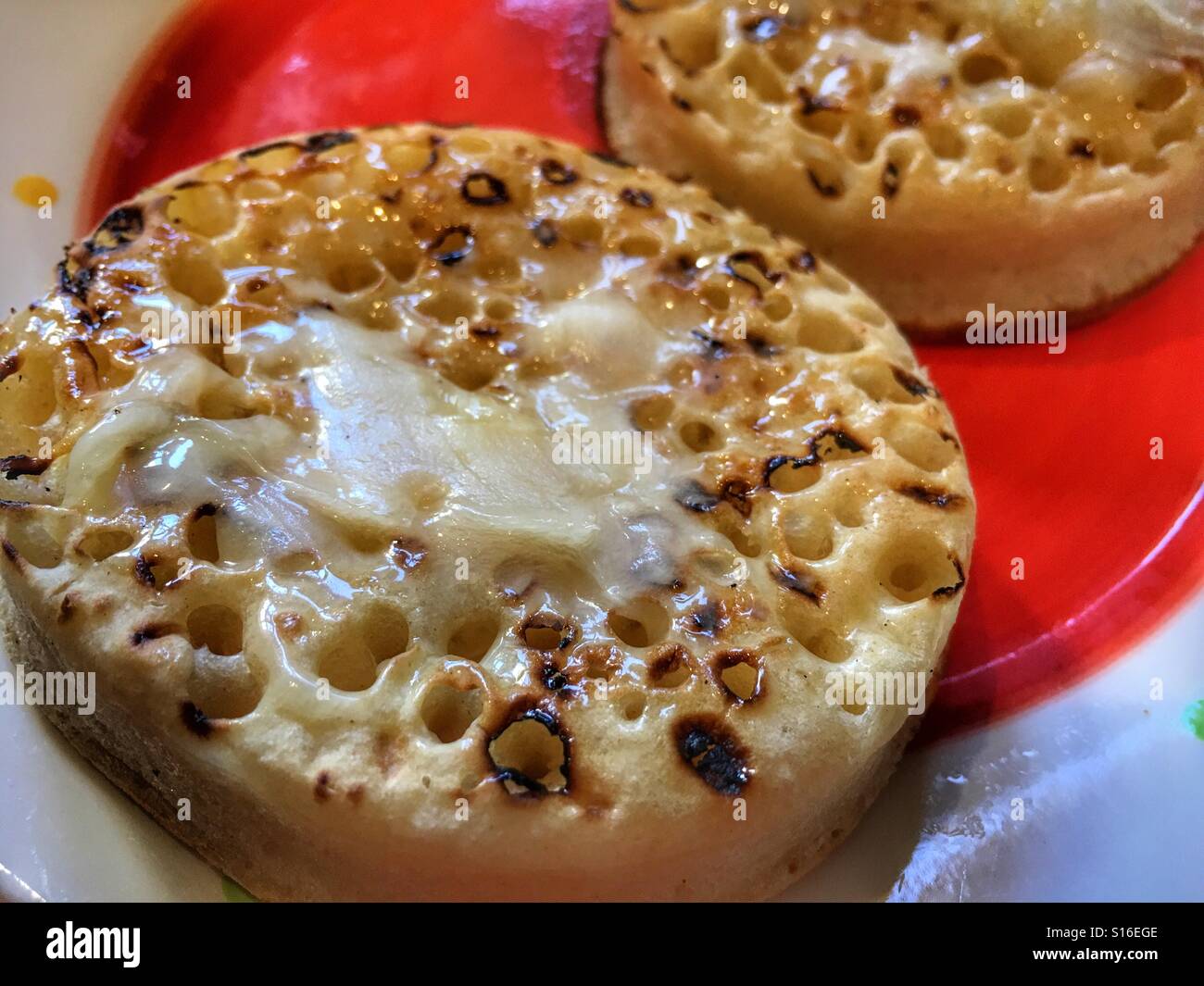 Set honey on a hot buttered crumpets - Smartphone Captured Stock Image