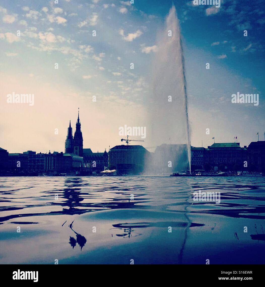 Floating on the lake and looking at Hamburg's skyline Stock Photo