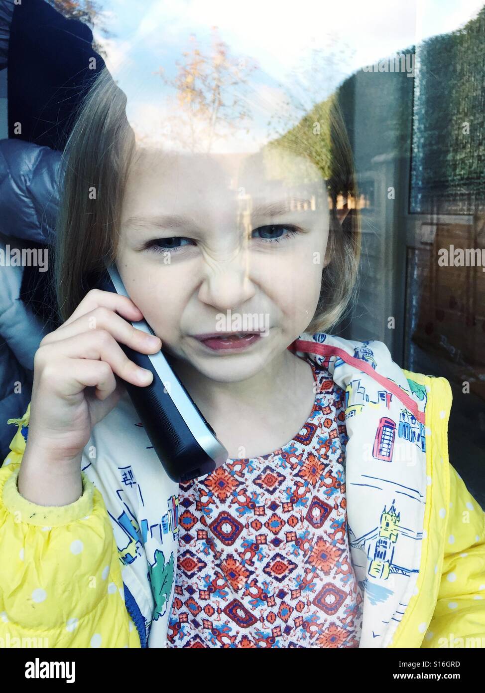 Girl on landline - Smartphone Captured Stock Image