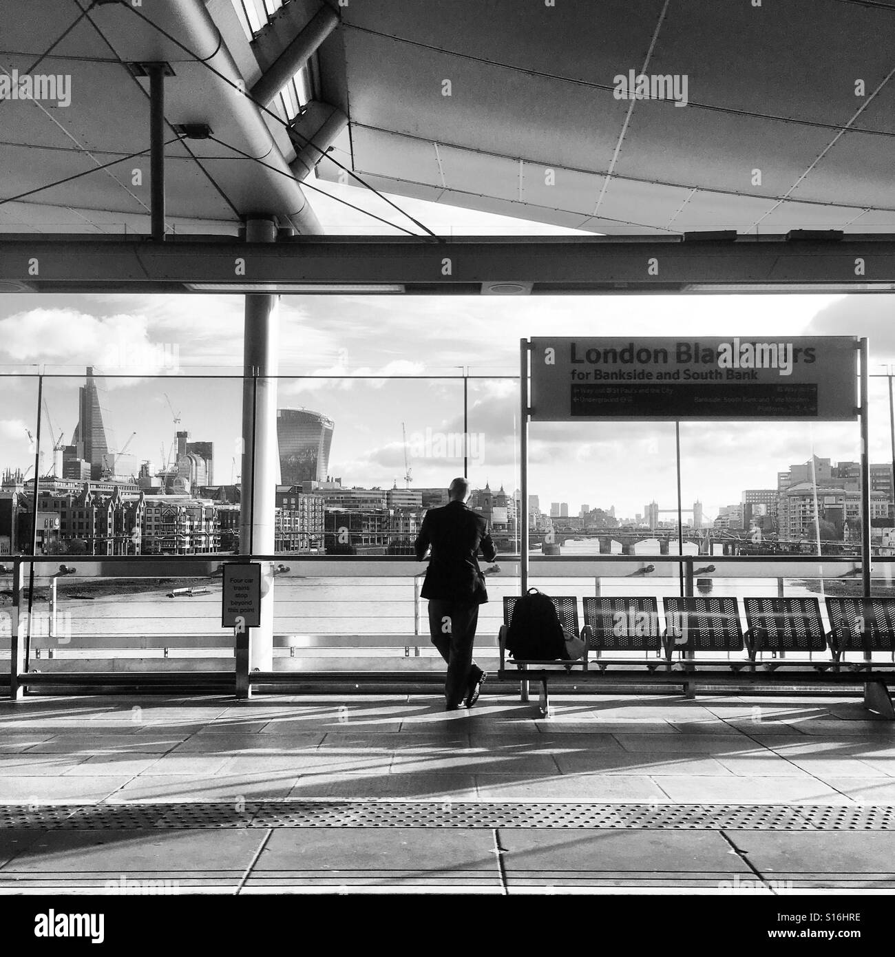 Commuter looking over London's skyline - Smartphone Captured Stock Image