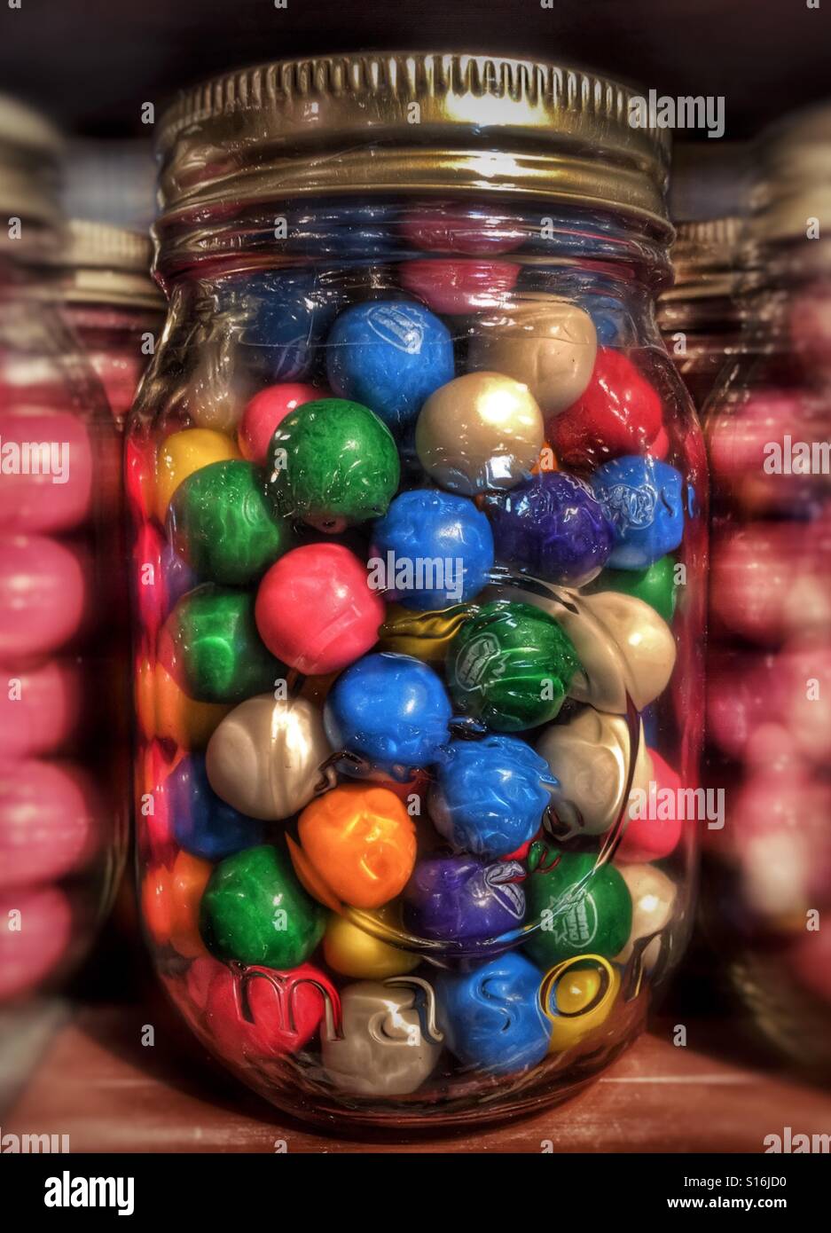 Colorful candy in a canning displayed on a shelf - Smartphone Captured Stock Image