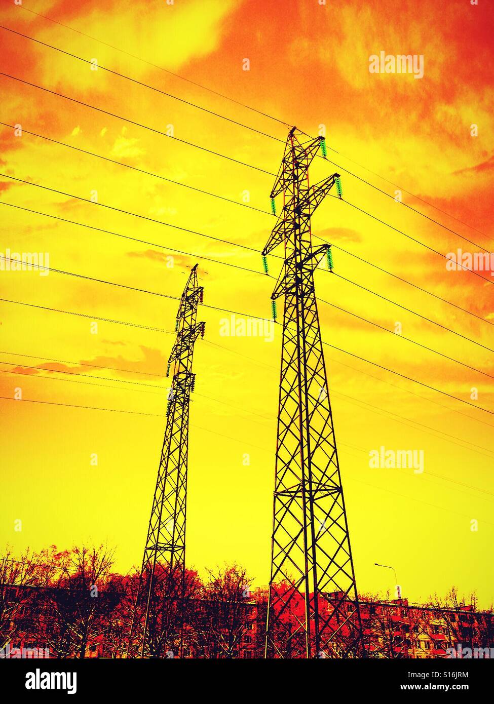 The power towers in amber light Stock Photo Alamy