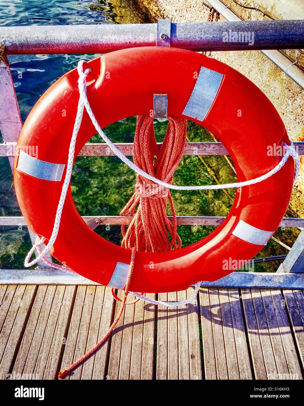 Lifebuoy ring on harbor Stock Photo