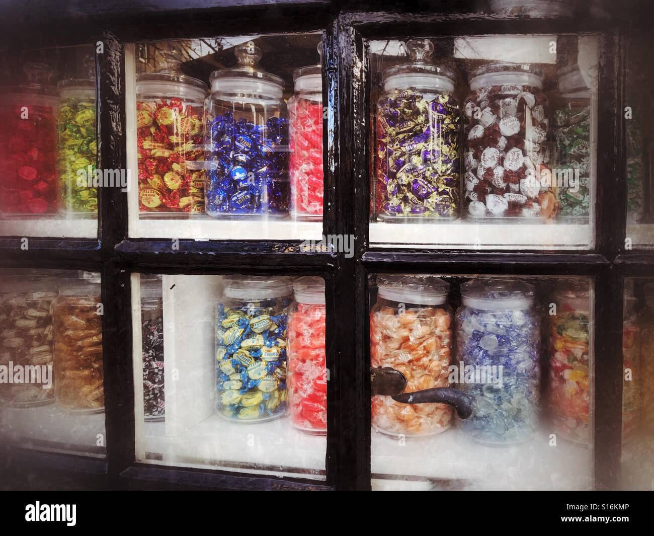 Old fashioned sweet jars in shop window Stock Photo Alamy