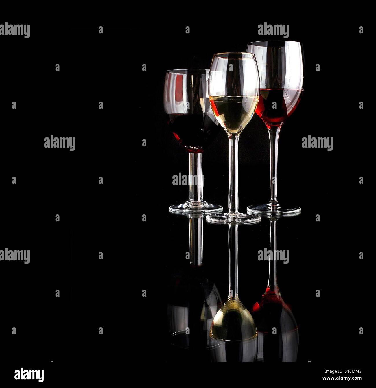 Wine in glasses on black - Smartphone Captured Stock Image