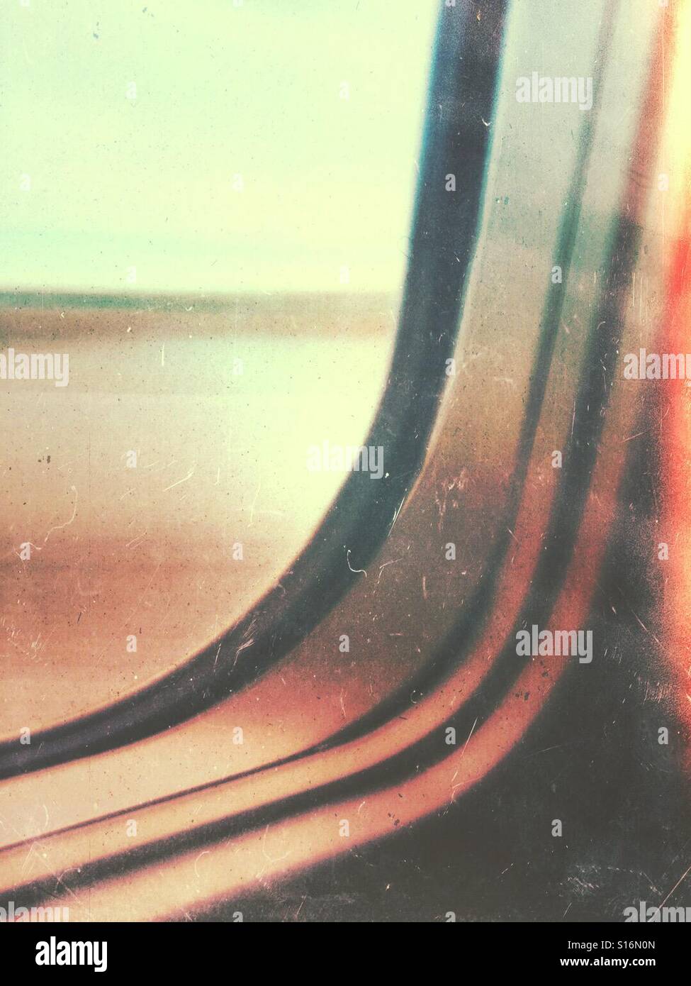 The view from the window seat as the airplane accelerates for takeoff. - Smartphone Captured Stock Image