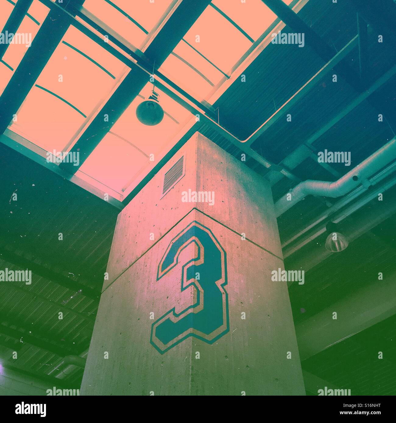 Number 3 floor sign inside a minimalist building - Smartphone Captured Stock Image