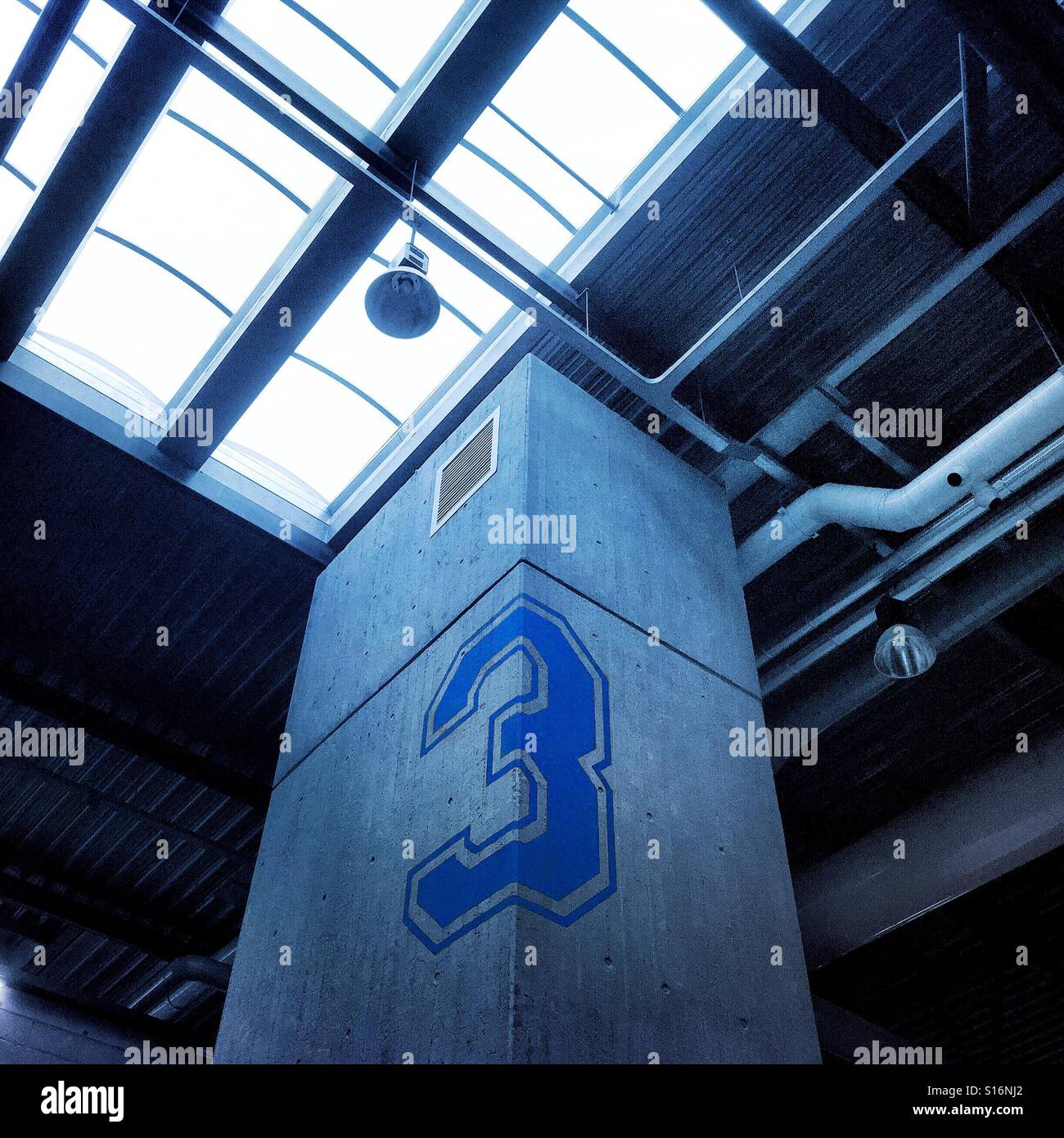 Number 3 floor sign inside minimalist building - Smartphone Captured Stock Image Number 3 floor sign inside minimalist building - Smartphone Captured Stock Image