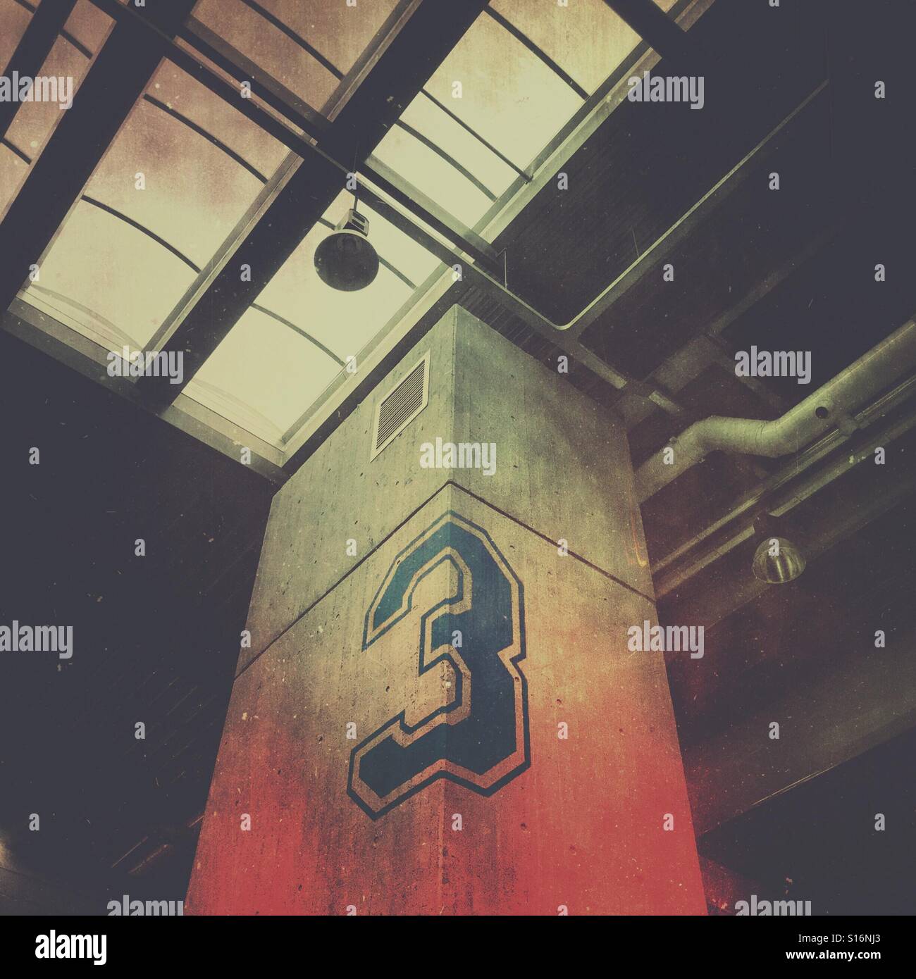 Number 3 floor sign inside minimalist building - Smartphone Captured Stock Image