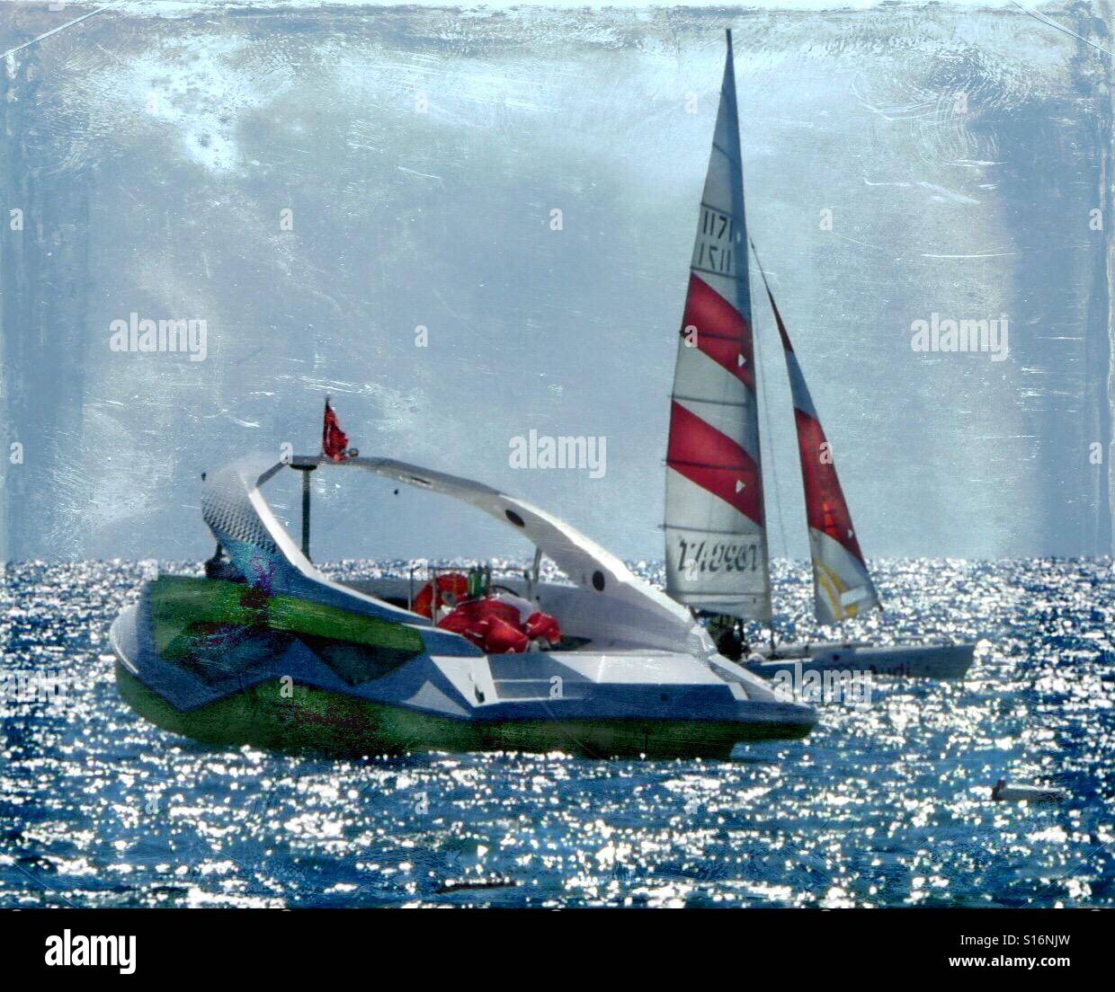 Motor Boat meets Katamaran. - Smartphone Captured Stock Image