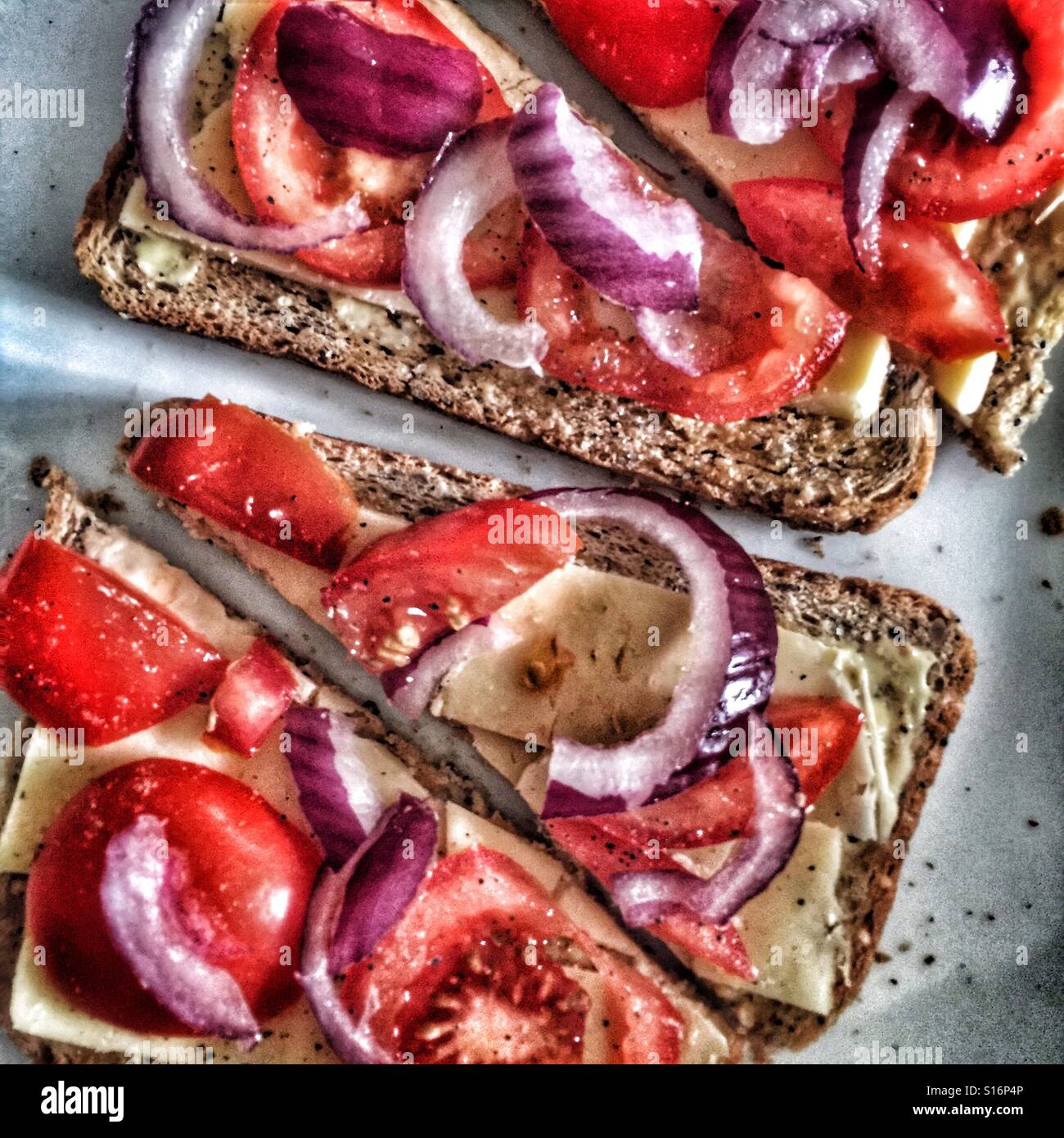 Cheese onion and tomato toast Stock Photo Alamy