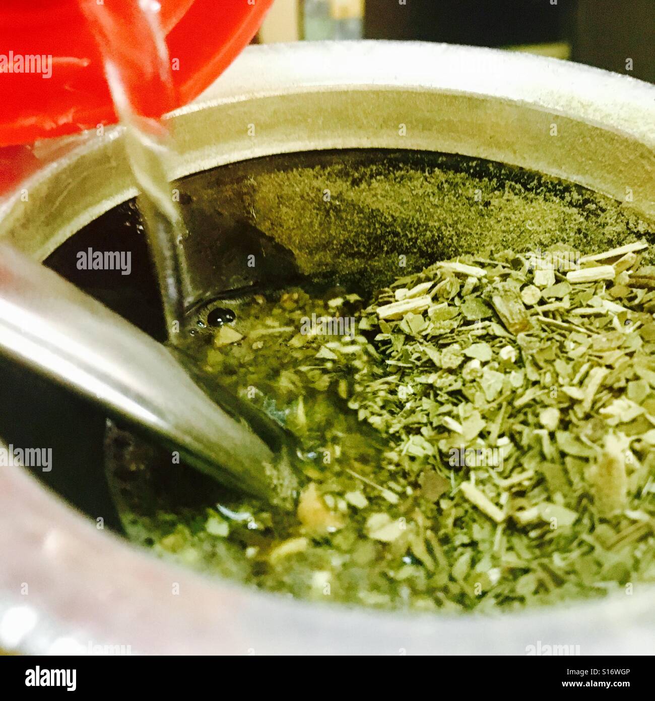 Pouring water on mate cup - Smartphone Captured Stock Image