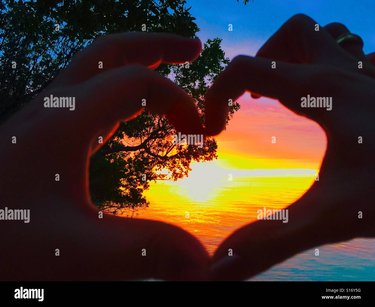 Sunset to wow the honeymooners Stock Photo