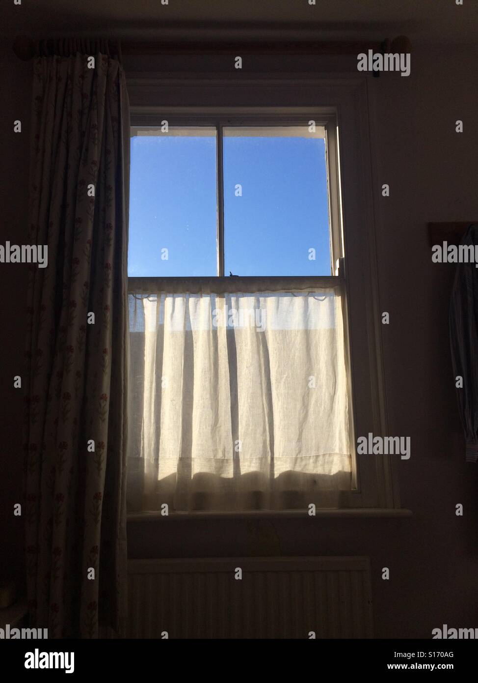 Interior Window and blue sky Stock Photo