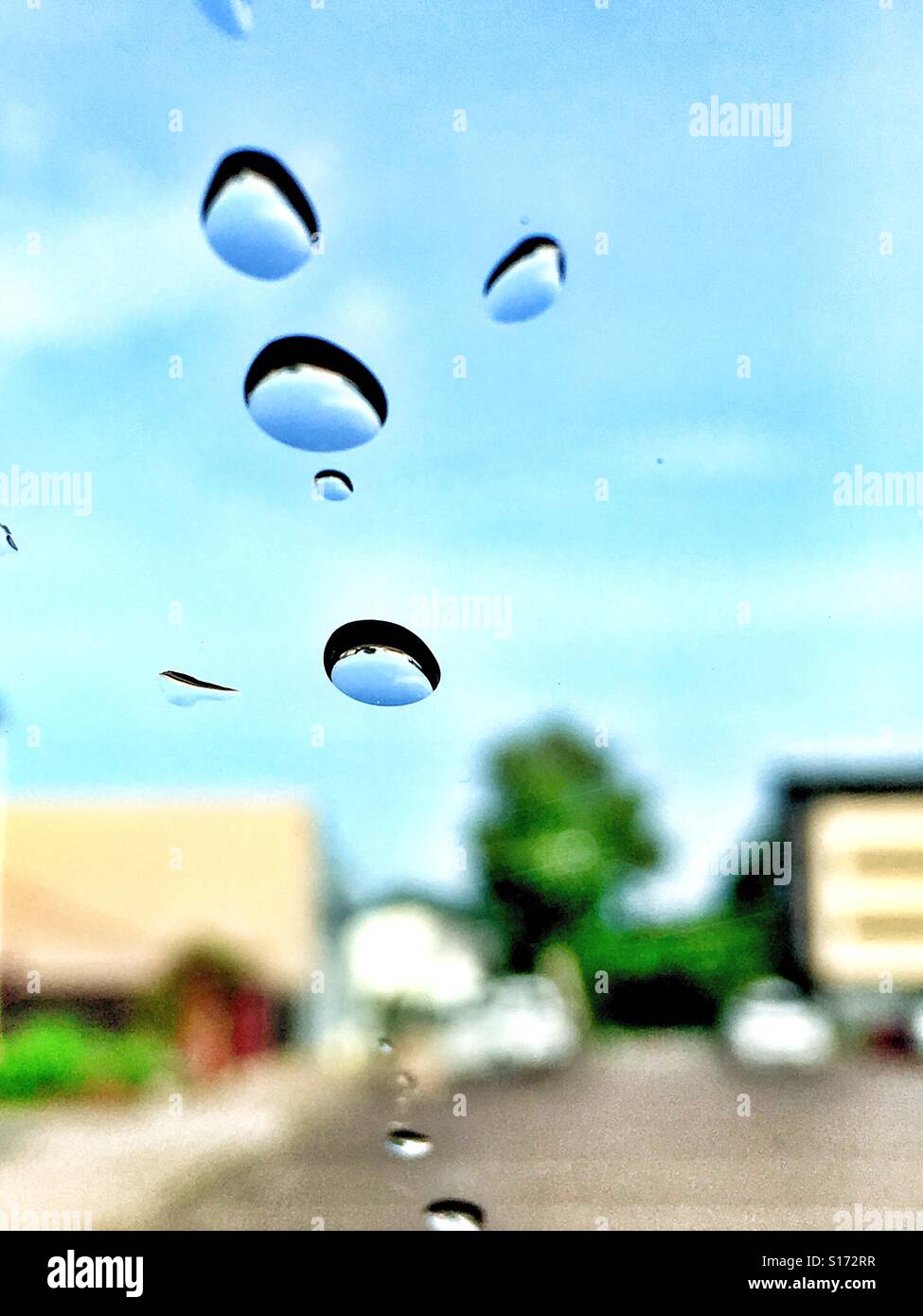 Rain drops on the windscreen. Stock Photo