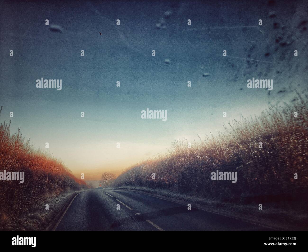 On the road, driving in hazardous conditions after an exceptionally heavy frost in winter. Minus 6 degrees. - Smartphone Captured Stock Image