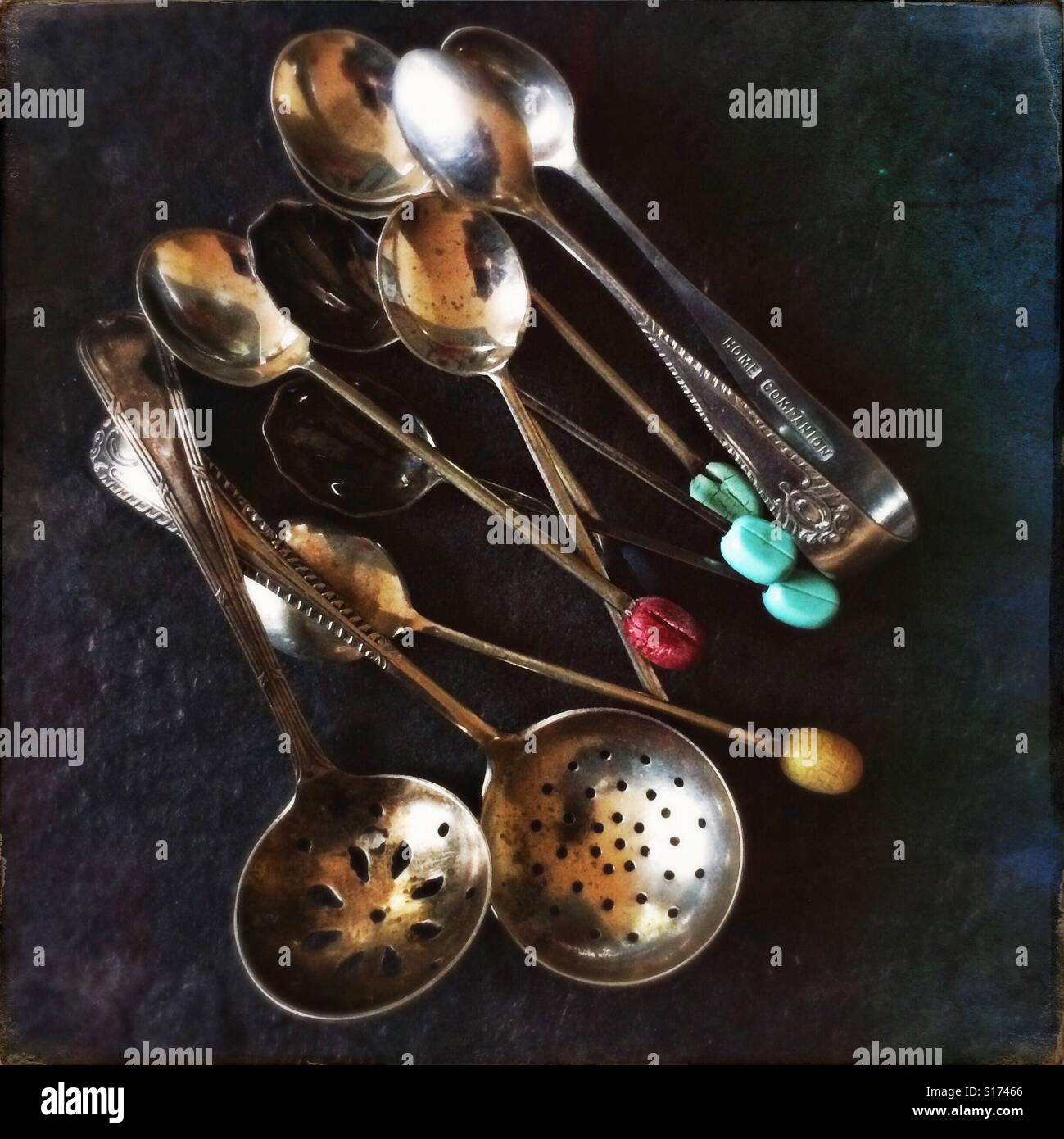 Collection of old silver spoons. Still life vintage cutlery. Stock Photo