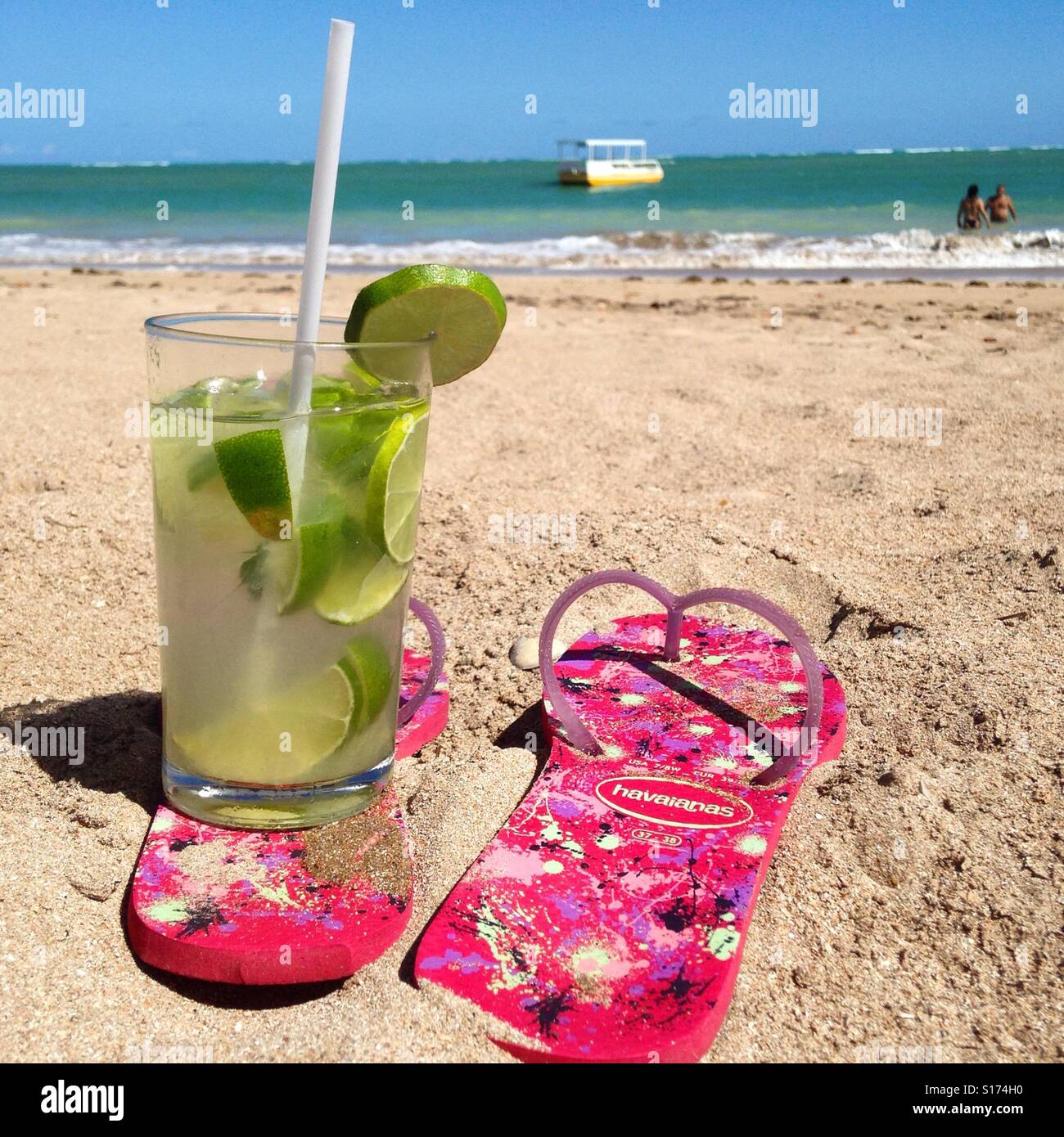 Vacation time with drinks on the beach. Stock Photo