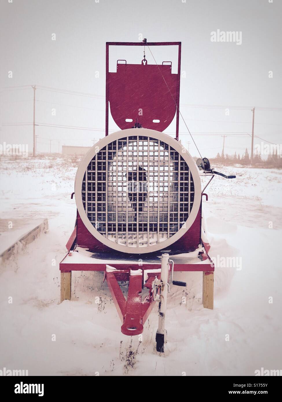 a trailer-mounted polar bear trap, baited with seal-oil-soaked canvas