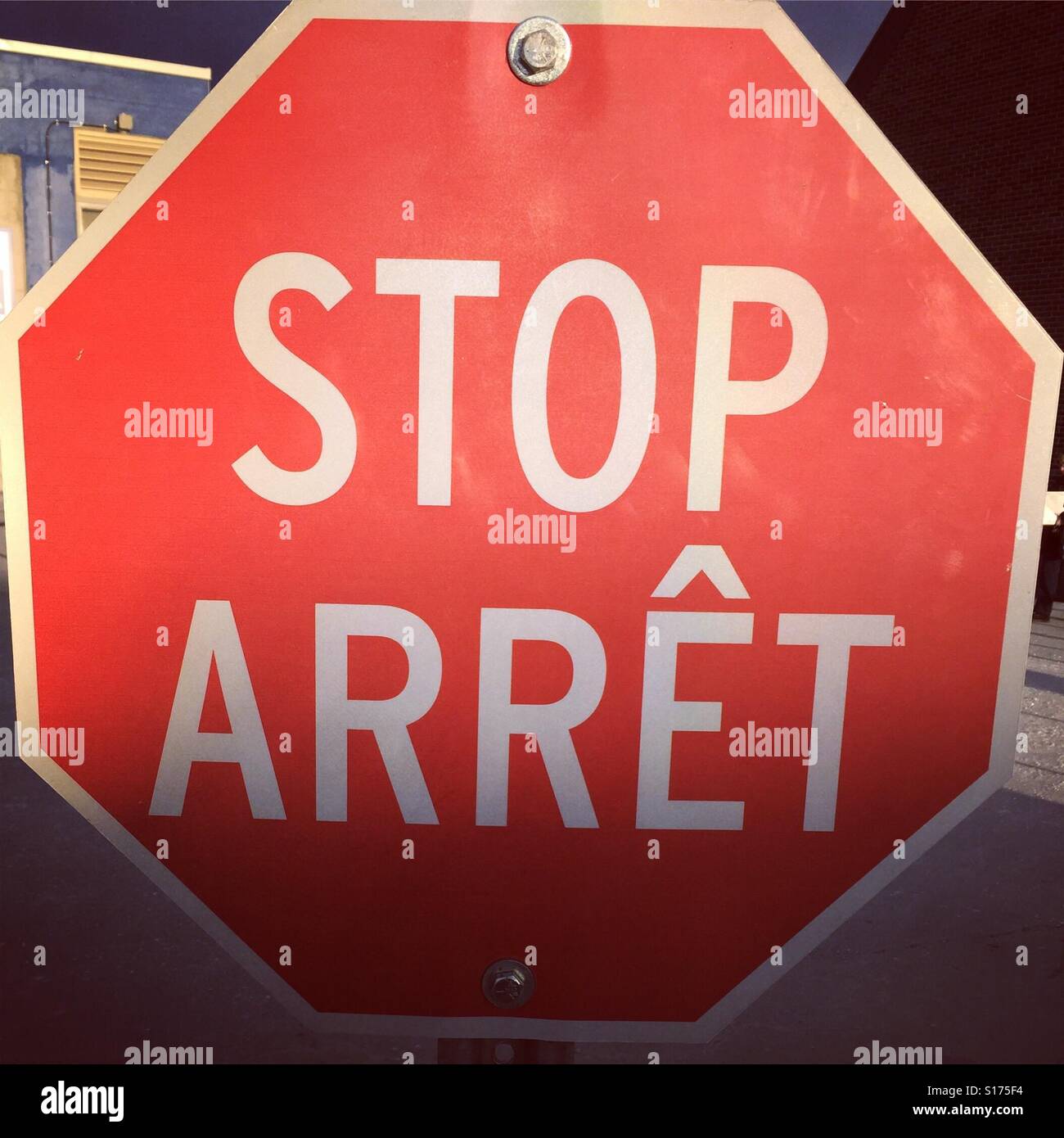 Bilingual stop sign by K.R. Stock Photo
