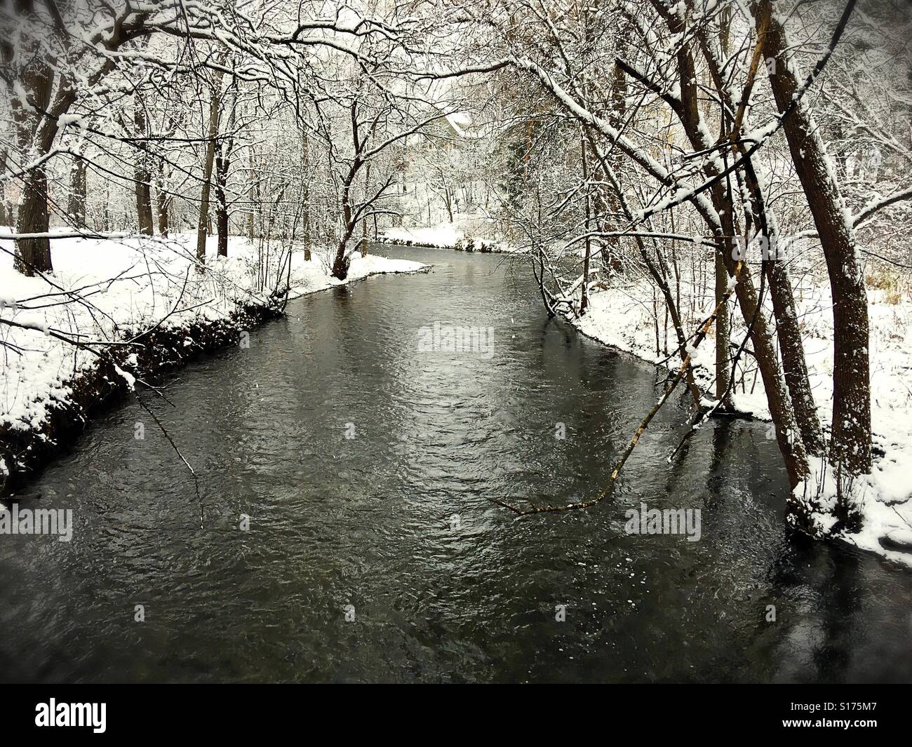 Minnehaha Creek in Minneapolis, Minnesota, surrounded by snow. Stock Photo