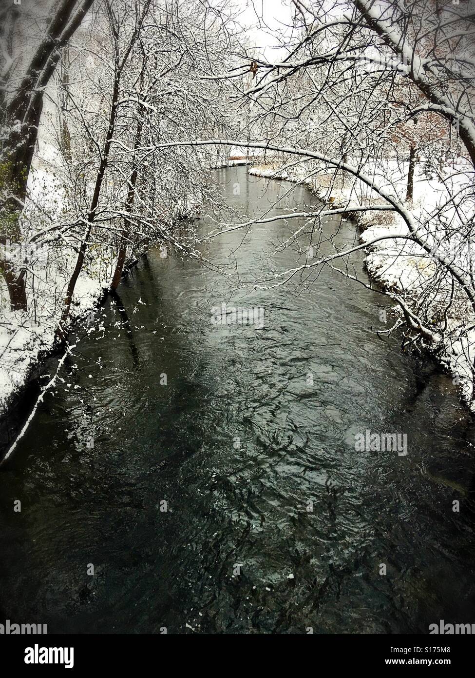 Minnehaha creek in Minneapolis on a winter day. Stock Photo
