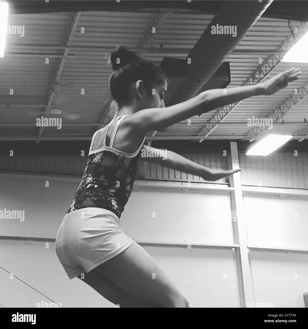 Gymnastics beam routine by K.R. Stock Photo
