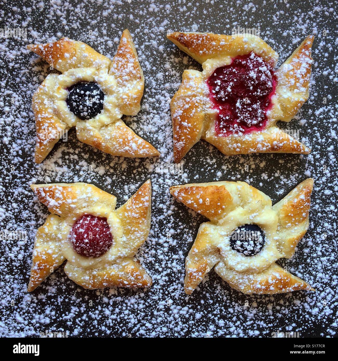 Puff pastry pinwheels with cream cheese, blueberry and raspberry Stock ...