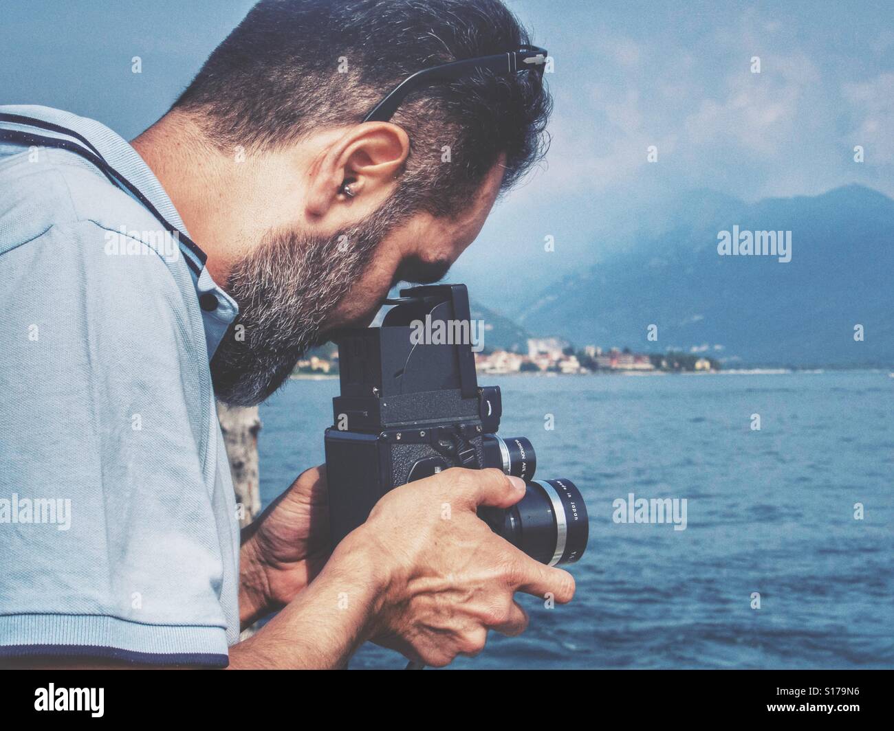 Analog photographer - Smartphone Captured Stock Image