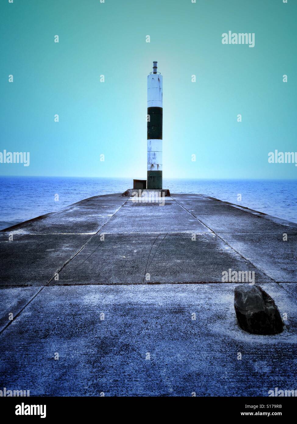 Beacon on jetty in Aberystwyth Wales UK - Smartphone Captured Stock Image