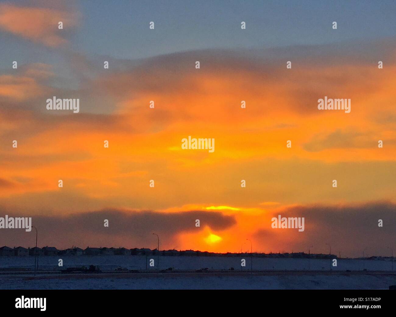 Beautiful sunset over the City of Calgary at -20 degrees C. - Smartphone Captured Stock Image