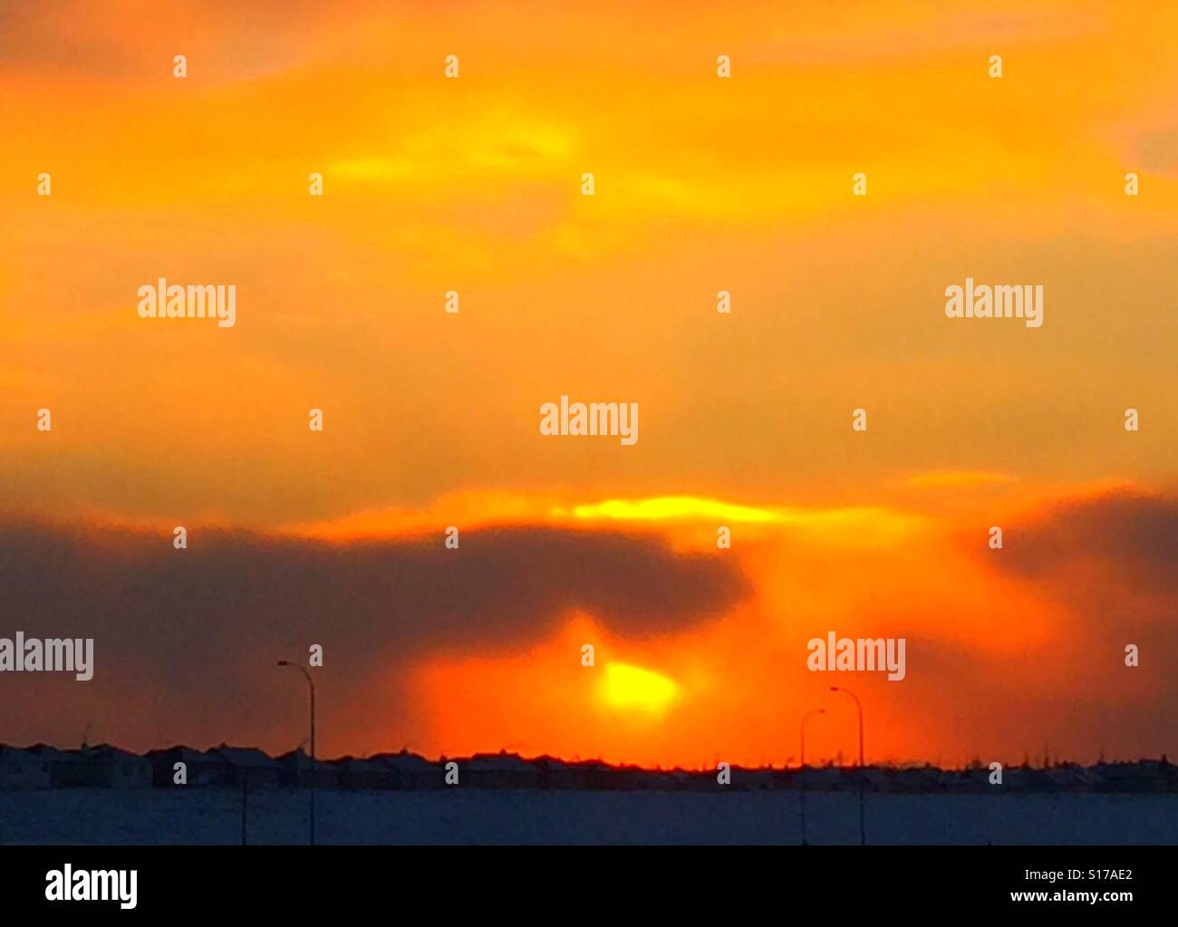 Winter sunset in Calgary, Alberta, Canada, at -20 degrees Celsius - Smartphone Captured Stock Image