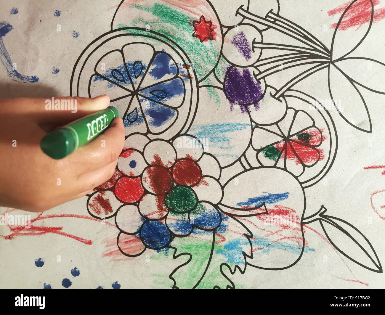 Toddler colouring in Stock Photo