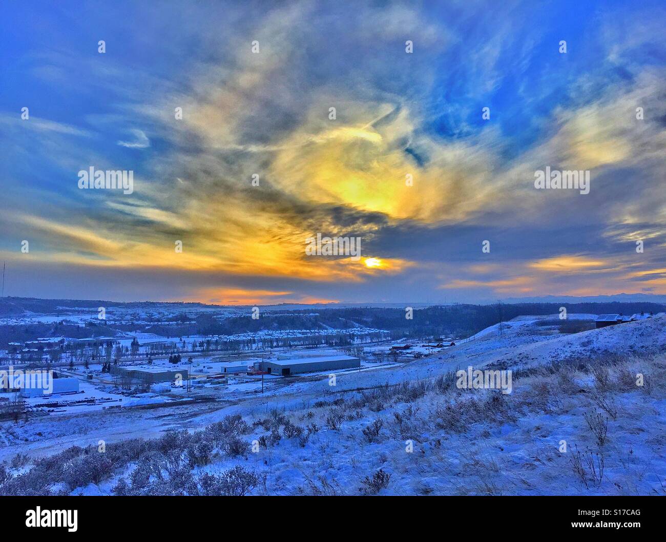 Pedestrian walking area and the city and gorgeous sunset at Calgary, Alberta, Canada, and minus 20 degrees - Smartphone Captured Stock Image