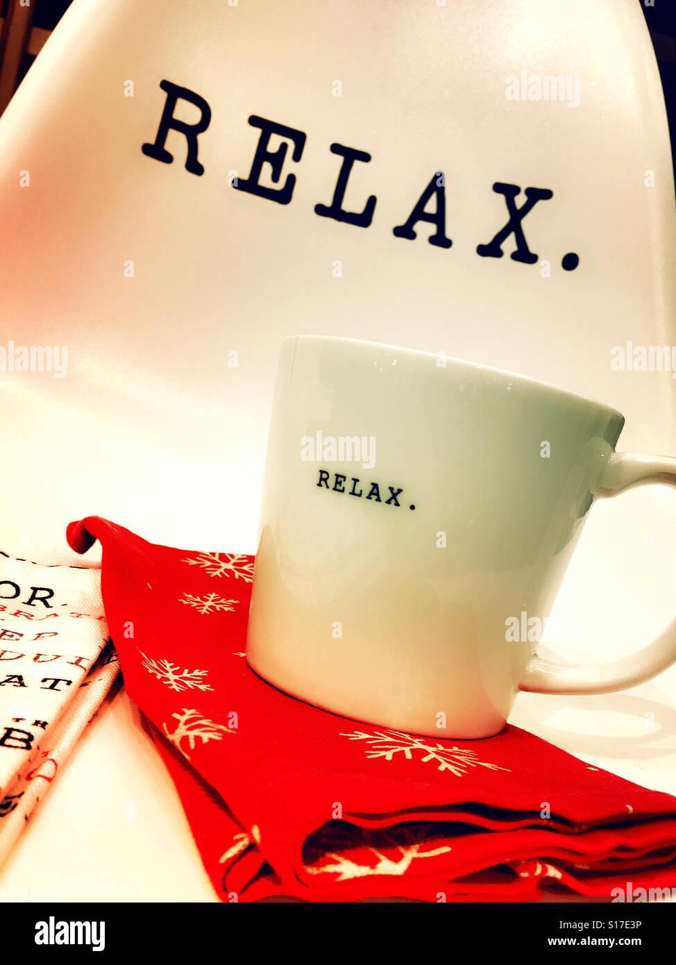 A store display encourages relaxation with a relax mug, towel and chair, USA. - Smartphone Captured Stock Image