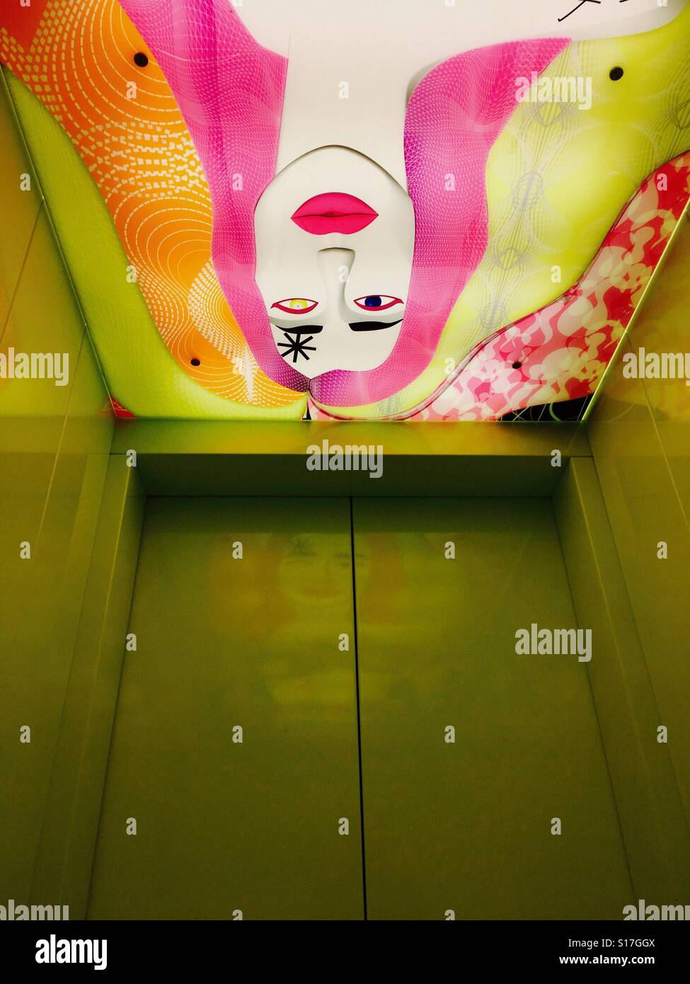 An artsy elevator at the hip nHow Hotel in Berlin, Germany - Smartphone Captured Stock Image