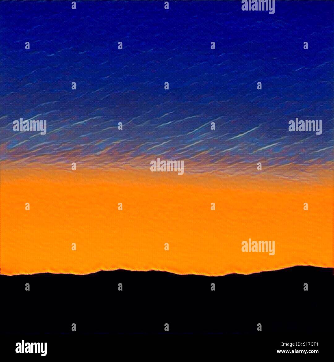 Surreal sunset over coastal range - Smartphone Captured Stock Image