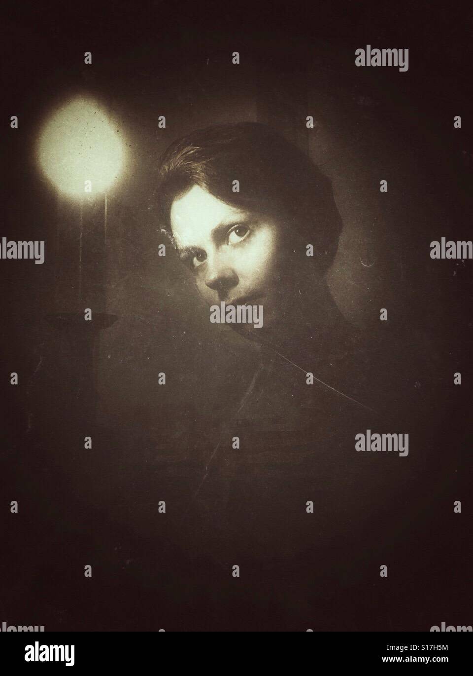 Woman's face in a dark - Smartphone Captured Stock Image