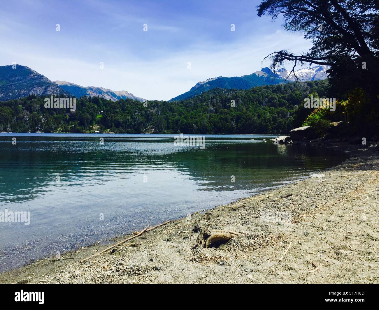Beautiful scenery of a beach in the Patagonia. Lakes and mountains. Stock Photo