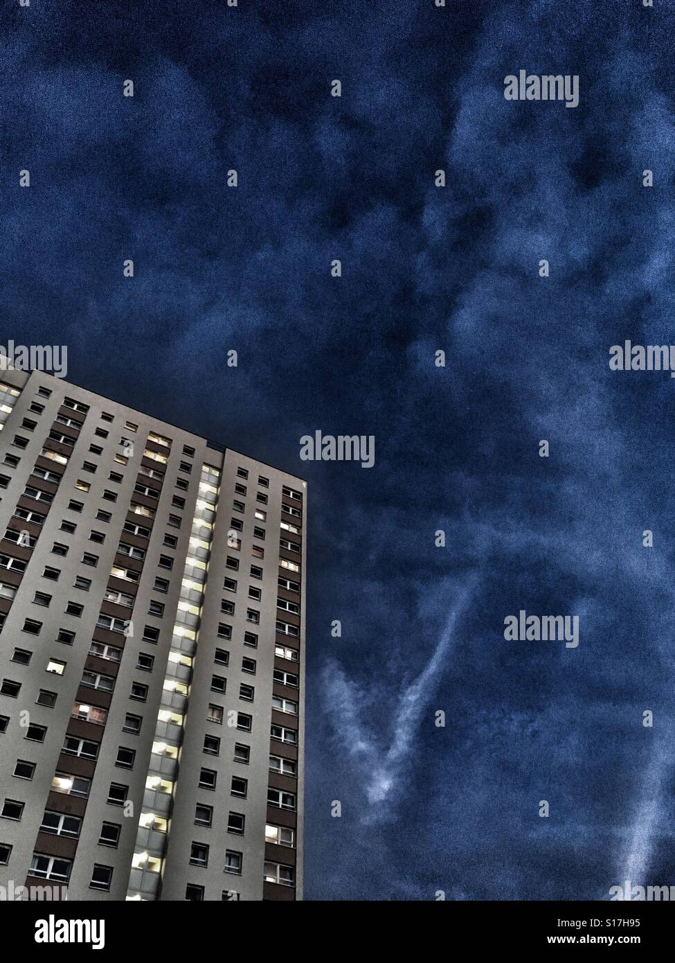 High rise blue sky Stock Photo - Alamy