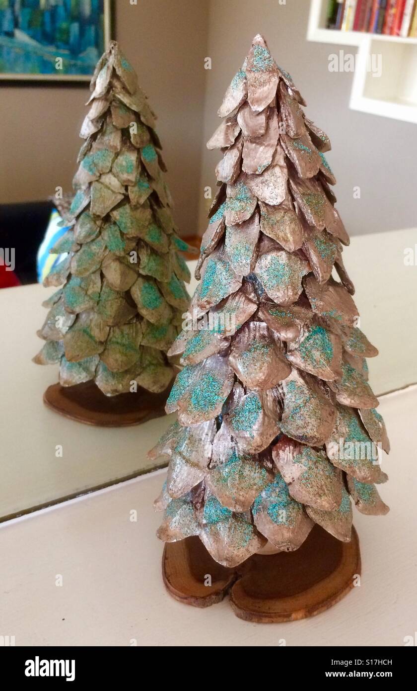 Christmas tree decoration made from pine cone sections Stock Photo