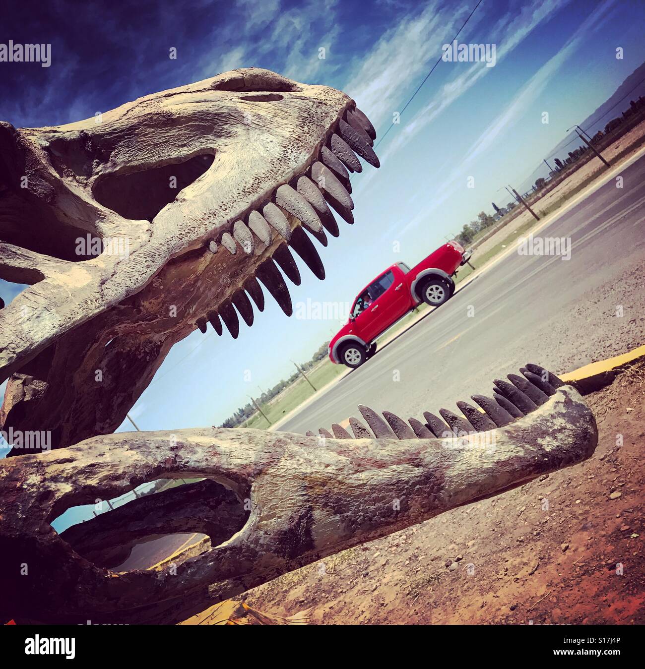4x4 eaten by dinosaur - Smartphone Captured Stock Image