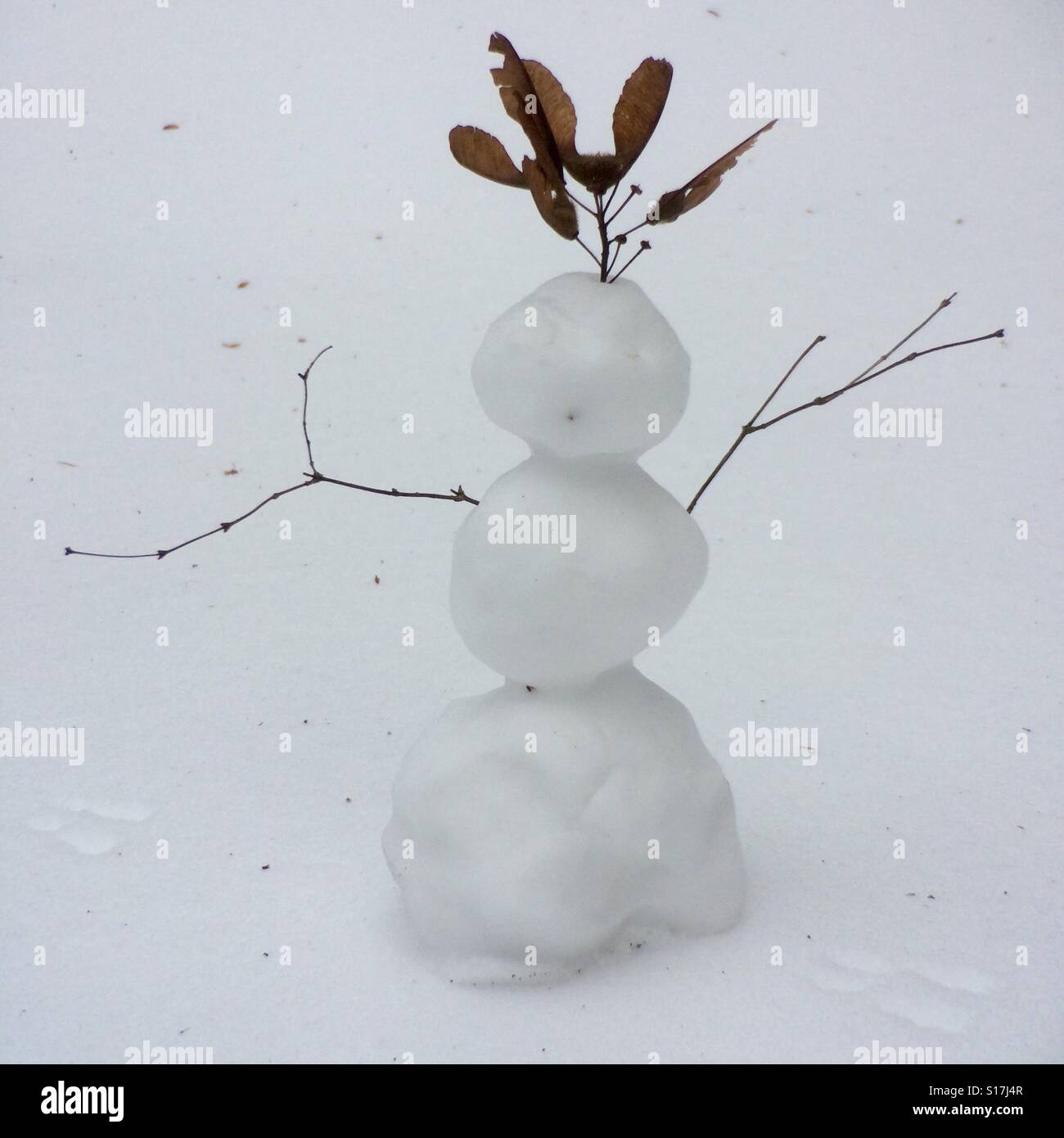 Little snowman, 12' high, winter snow, Oregon - Smartphone Captured Stock Image