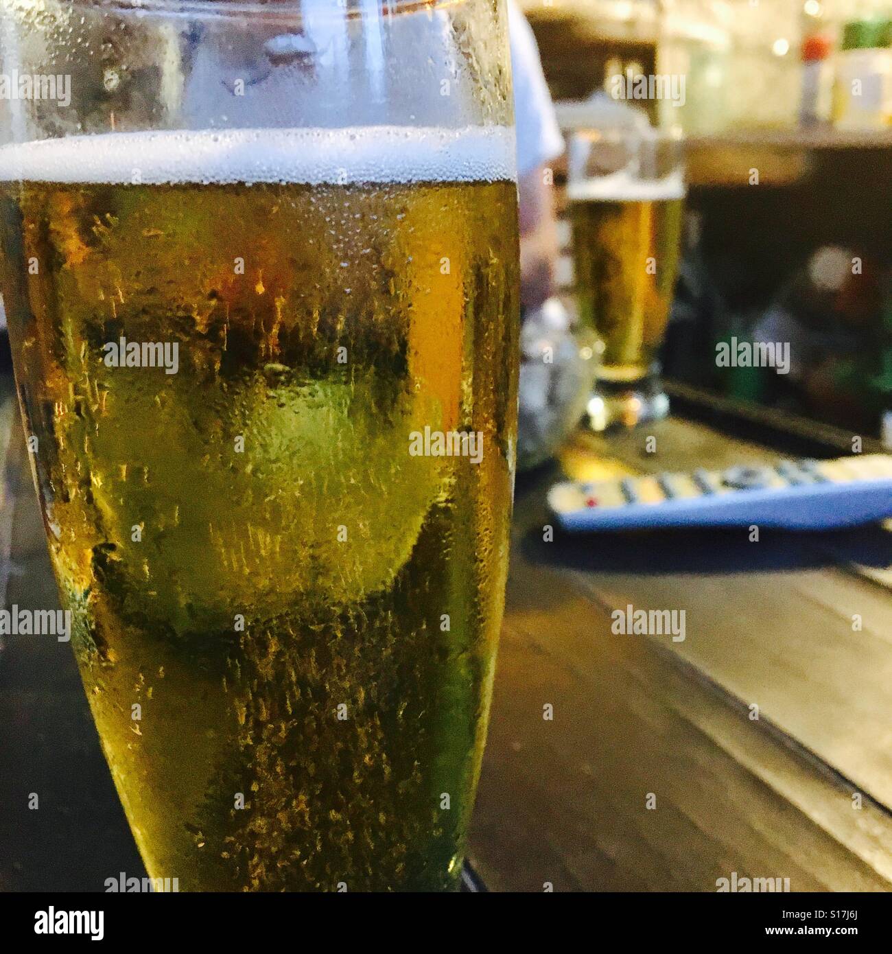 A couple of glasses of beer on the table - Smartphone Captured Stock Image