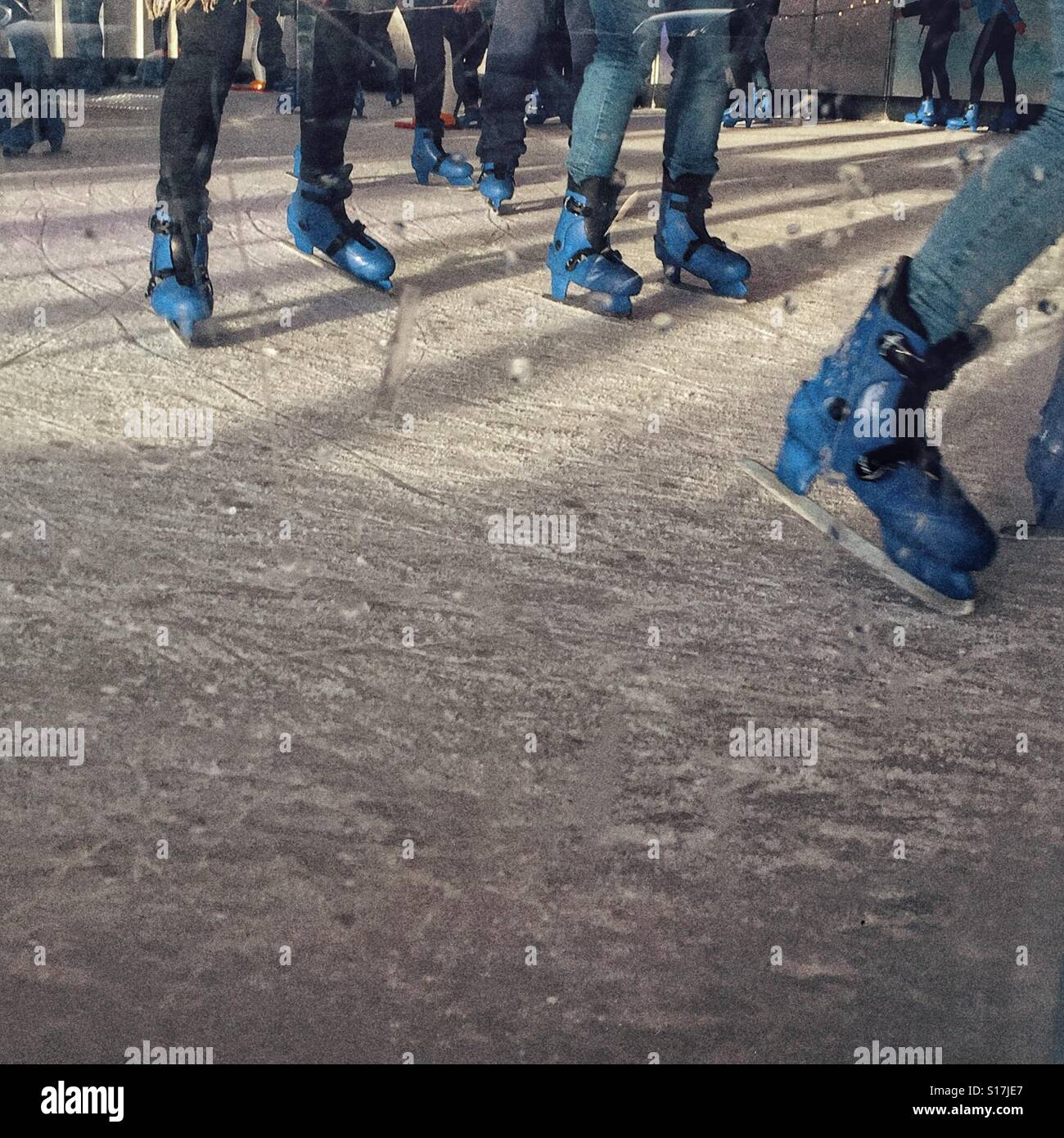 Ice skating legs and feet Stock Photo Alamy