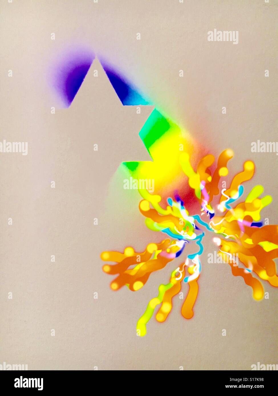 Star of David created by the sun coming through a window crystal and a tetrahedron. - Smartphone Captured Stock Image