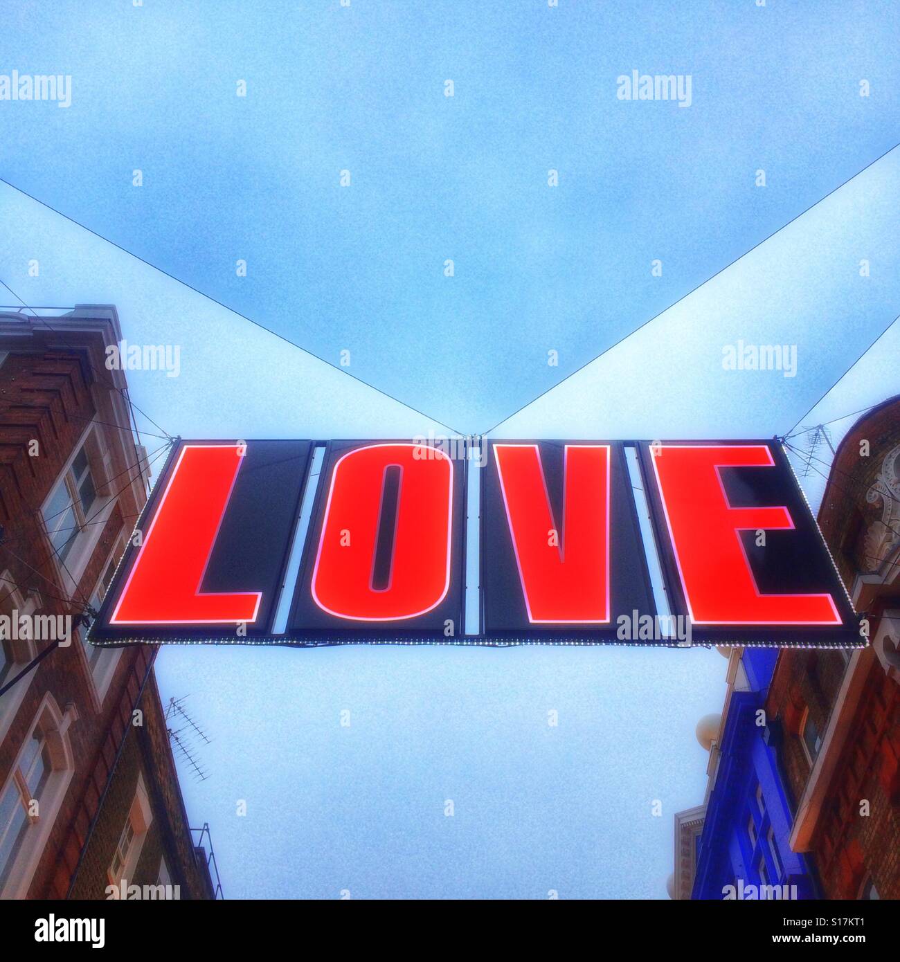 A love sign Christmas sign on Carnaby Street, London - Smartphone Captured Stock Image